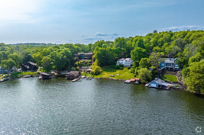 Large homes in Hopatcong line the Lake Hopatcong shoreline with private docks and desirable views.