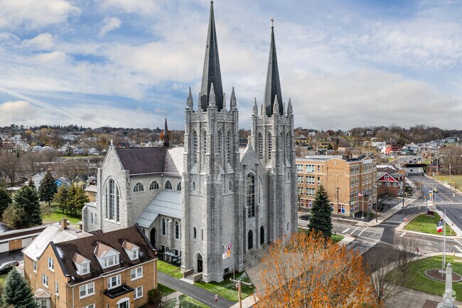 The Basilica of the Sacred Heart of Jesus has massive spires that mark the entrance to Park Ave.
