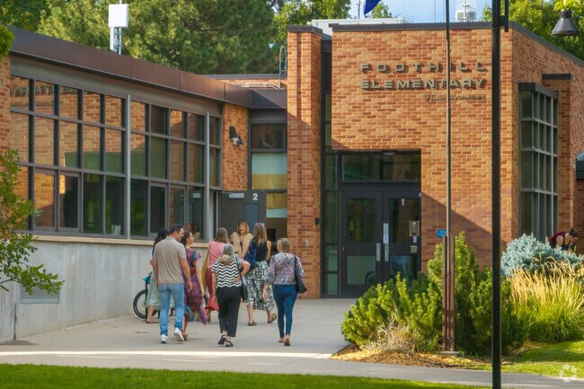Foothill Elementary in Boulder features a welcoming entrance surrounded by greenery.