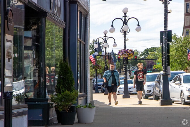 McCarty Burlington residents enjoying an afternoon walk in nearby Downtown Aurora.