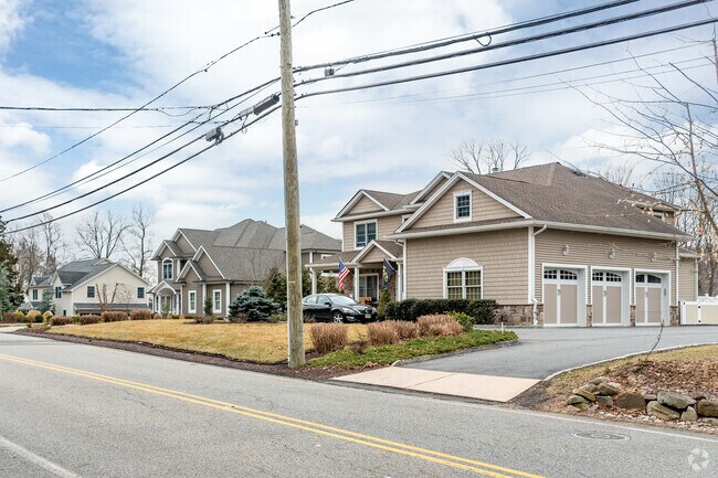 Single-family homes in North Haledon typically have large driveways attached.