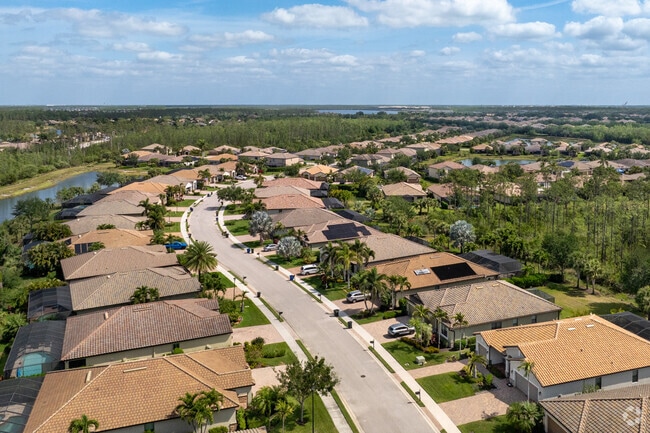 The Preserve At Corkscrew is a neighborhood with lakes and natural cypress woods surroundings.