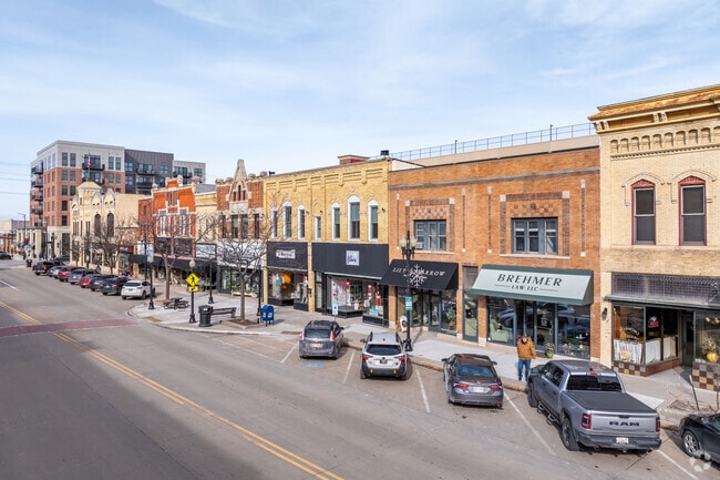 Downtown Neenah is busy with people visiting local businesses and shops.