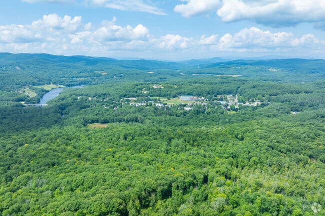 New Hampton is a neighborhood that sits between the beautiful forests of New Hampshire.