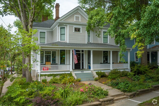 Boylan Ave is lined with mature trees and Queen Anne style homes.