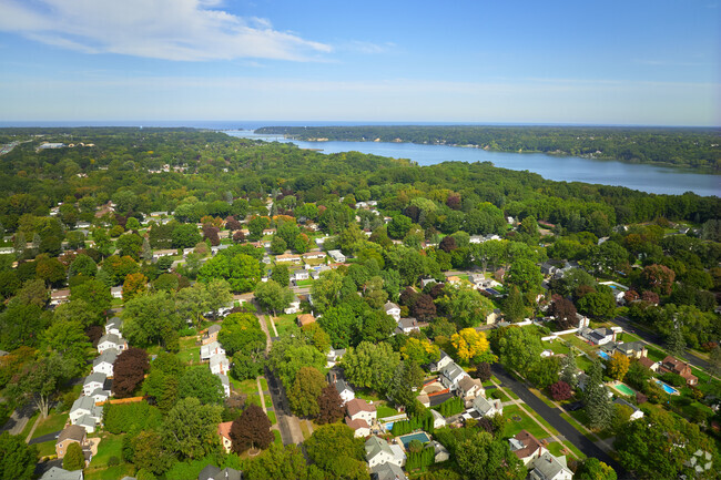 A great view of Irondequoit with Irondequoit Bay and Lake Ontario in the background.