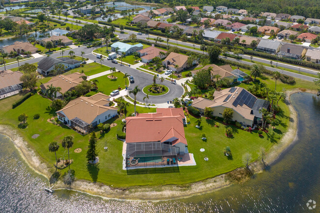 Elegant waterfront homes adorn the shores of small ornamental ponds in the Cross Creek Estates association.