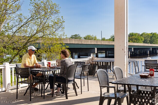 Enjoy water views on the patio at Love's Steak and Seafood.