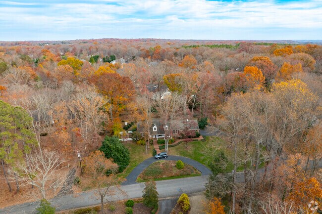 Homes in Argyle Heights are nestled among the forested landscape.