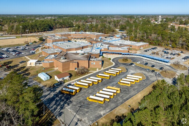 Aynor High School is centrally located near residential neighborhoods.