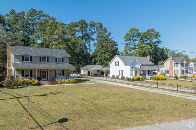 Multi-level homes are found in Highland Park and sit back off of the main road.