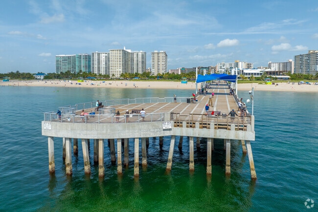 Pompano Beach fisher family pier fills with locals a tourists.