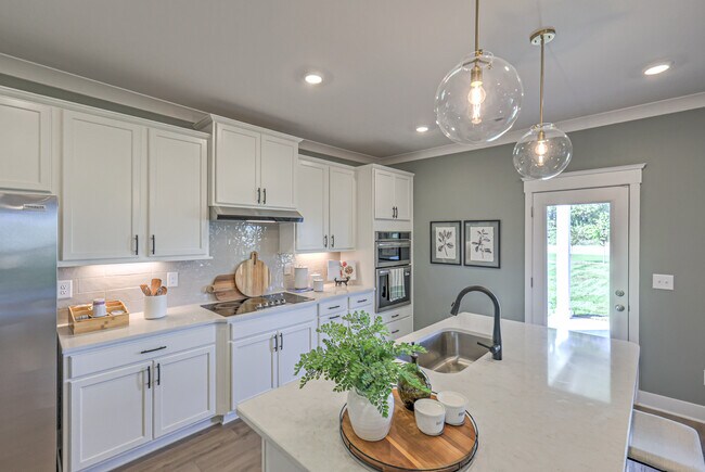 The Winston *Photo of model home, selections and finishes may vary.