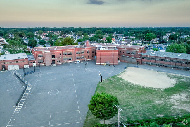 Wheeler Avenue School has firleds and courts for recess and sports.