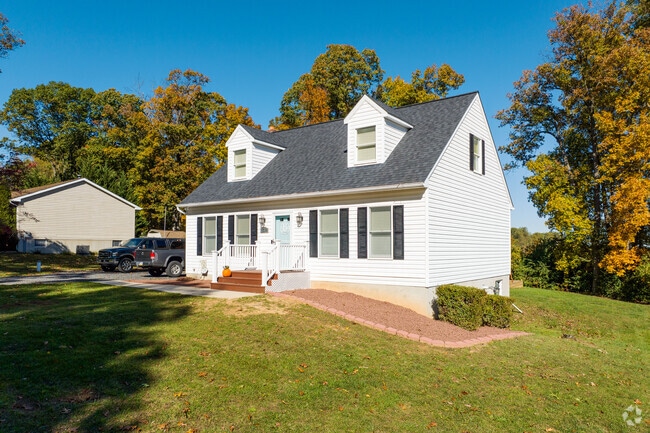 Susquehanna Trails features Cape Cod-style homes with pitched roofs and cozy charm.