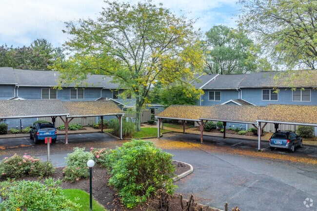 Some of the townhomes in Orchard Park feature car ports.