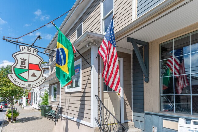 Flags wave outside PBF Cafe in Montgomery’s historic downtown district.