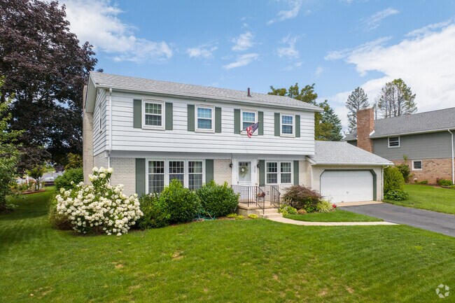 Two story Modern Colonial homes line the streets of Whitfield.