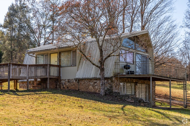 You can find lots of A-frame wood and stone cabins in Townsend.