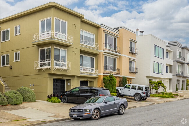 Townhouses show varied color palettes across Jordan Park/Laurel Heights.