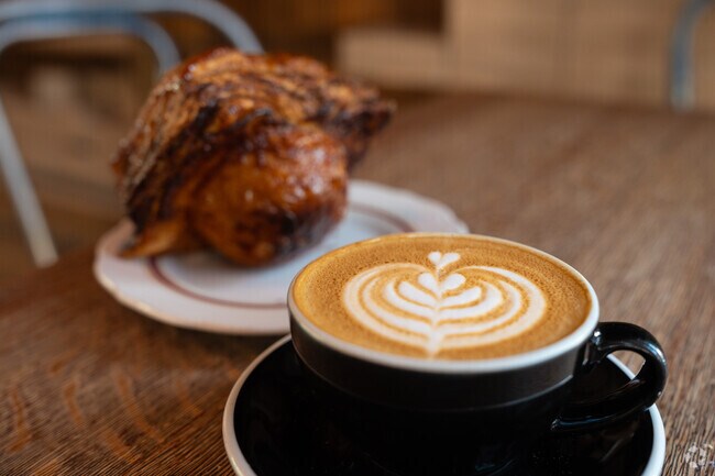 Get a delicious cappuccino and pastry at Devil's Food Bakery near Cory-Merrill.