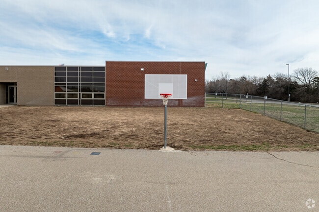 Prairie Elementary School has an outdoor basketball court.