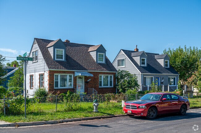 A pair of cape cod style homes on Roanoke Ave in East Riverdale.