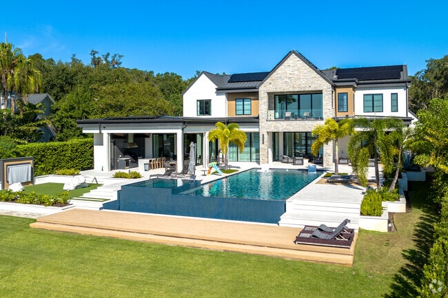 This new traditional-stye home in Windermere features an extravagant pool.