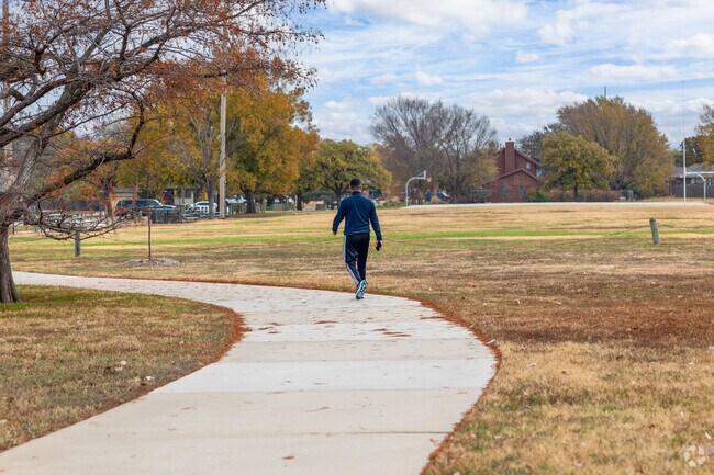 Enjoy a walk along the trails at Harrison Park near Cedar Lakes Village.