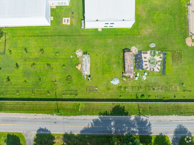 There are garden plots and a green house outside of Sebasticook Valley Elementary School.