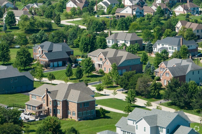 Mature trees and large lots provide privacy in South Barrington neighborhoods.