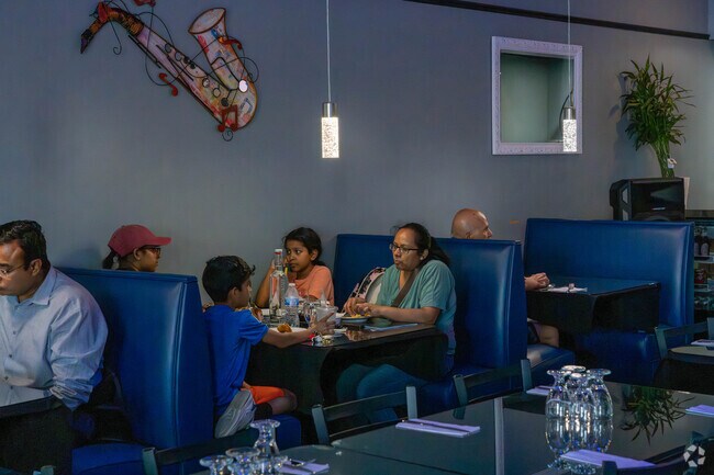 Diners enjoy the food and atmosphere at Indian Fusion Restaurant in Beckett Ridge.