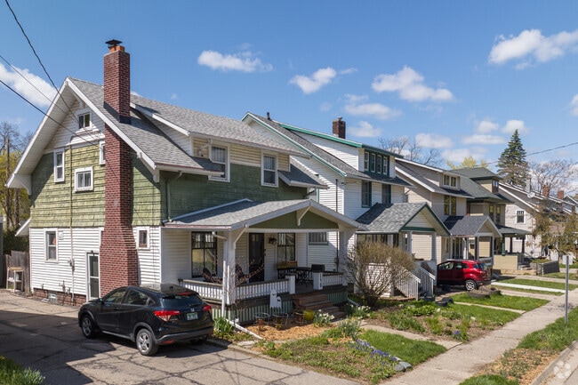 Rows of two-story homes with porches appear near Michigan Avenue in Fairview Area.