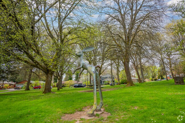 View the Keith Gellum sculpture 'Vincent, Waiting for Alice' at Pendleton Park in Hayhurst.