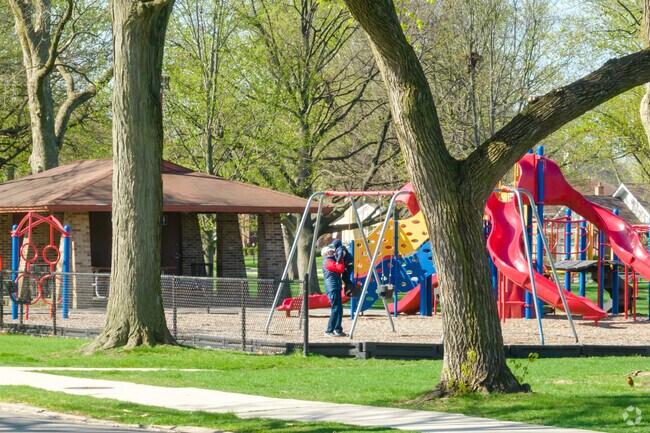 It Is Always Fun to Play on a Swing Set in Springdale Park in Springdale.