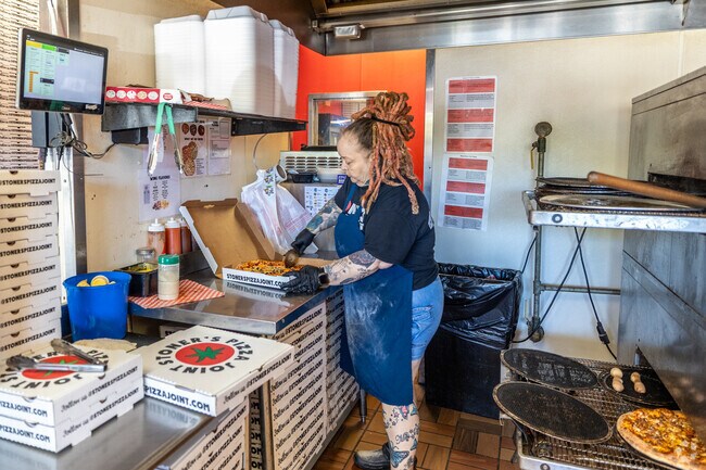 Stoners Pizza Joint has a bustling take-out service for their delicious pizza.