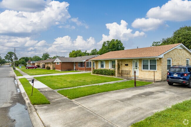 The quiet streets with sidewalks are typical in Pines Village.