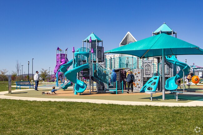 The colorful playground equipment is the highlight of Sophie & Madigan's Playground.