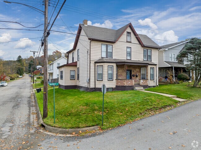 An eclectic home sits proudly on a corner lot in Baden.