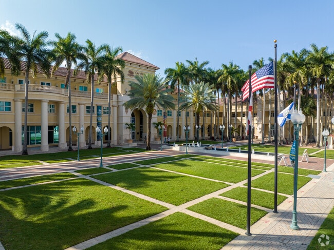 Palm trees line the entrance to the Inner Plaza.
