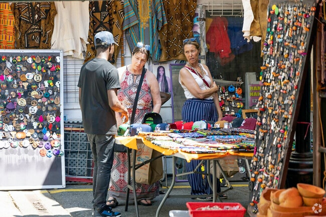 Little Senegal residents come in many races and creeds who interact daily with smiles and love.