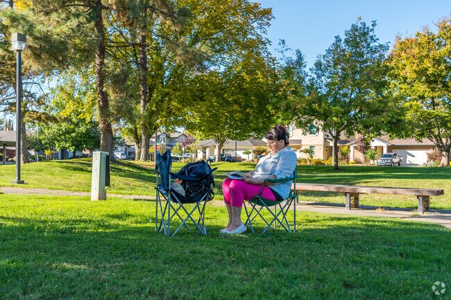 Enjoy a nice afternoon at Greenfair Park and read a book under the oak trees.