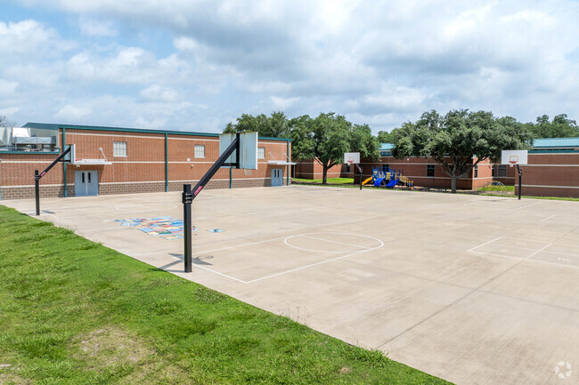 Rustic Oak Elementary boasts several basketball hoops.