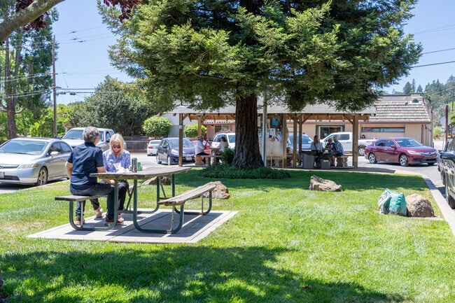 Locals gather outside Corralitos Market & Sausage Co. to enjoy lunch and sunshine on the lawn.