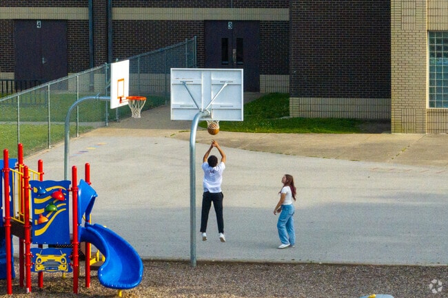 Farrington Grove Public Pre-K & Elementary School has a couple outdoor basketball courts.