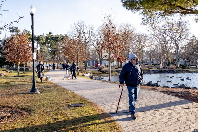 Enjoy a walk in the park at Heckscher Park.
