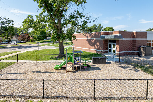 A smaller fenced play structure is perfect for younger students at Cascades Elementary School.