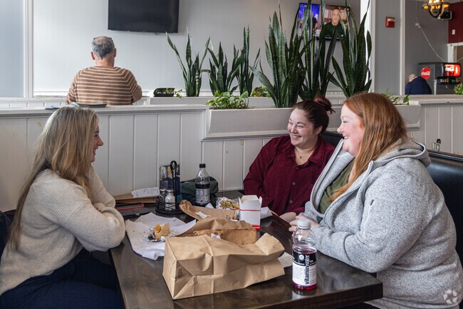 Friends gather for lunch at Foreside House of Pizza in Falmouth Foreside.