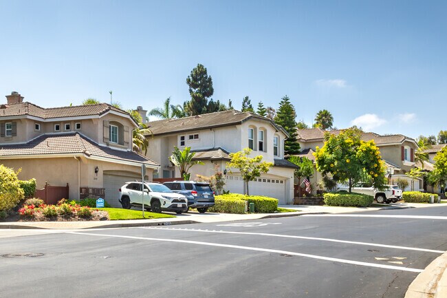 Spanish-style homes with ample garage space are perfect for families in Rancho Carlsbad.