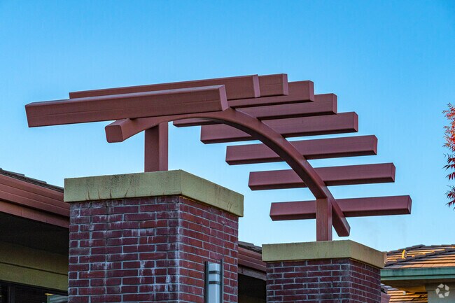 Detailed metal arch spans the entrance to Peak Prep Pleasant Valley.